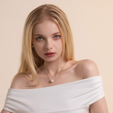 Model Wearing a 12.0mm White Freshwater Pearl Pendant - De Blancas