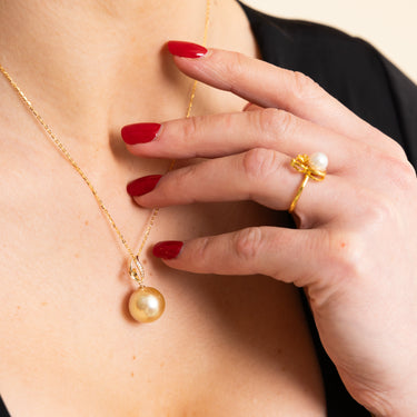 Model Wearing a Golden South Sea Pearl Pendant - De Blancas